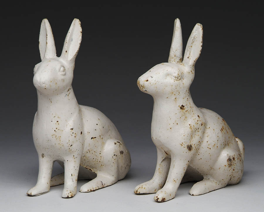 Appraisal: PAIR OF CAST IRON VICTORIAN STYLE RABBITS These fanciful garden