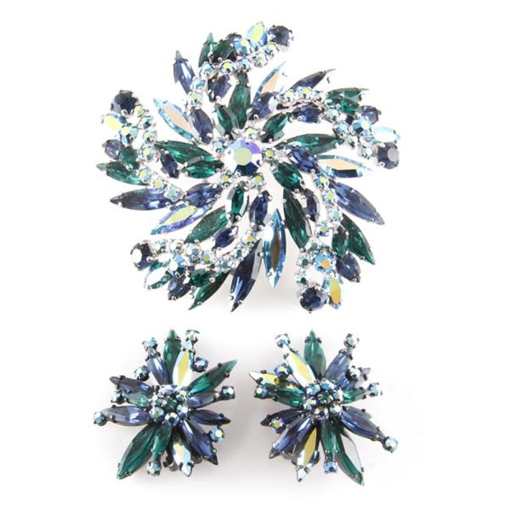 Appraisal: SHERMAN PINWHEEL SHAPED PIN BROOCH WITH GREEN BLUE AND AURORA