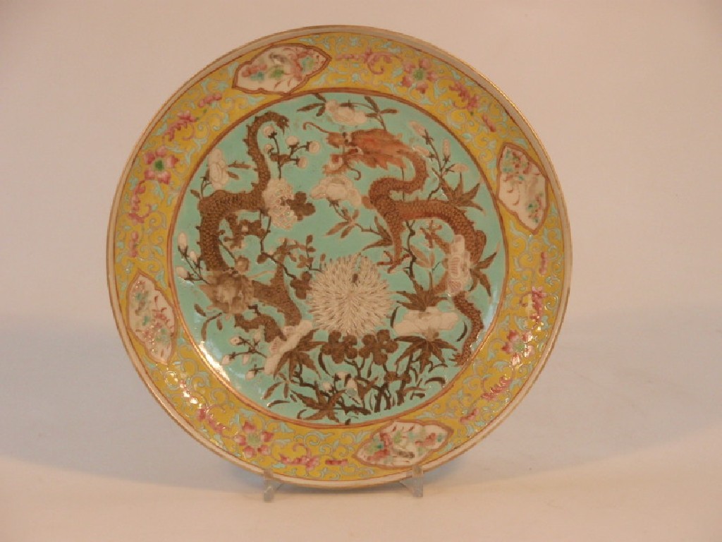 Appraisal: A Chinese Famille Rose plate painted to the centre with