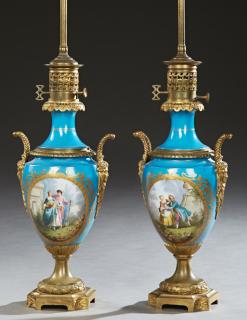 Appraisal: Pair of French Porcelain and Bronze Moderator Lamp Pair of