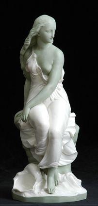 Appraisal: MINTON CELADON PARIAN AND IVORY GLAZED FIGURE MIRANDA Model by