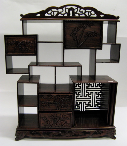 Appraisal: CHINESE ROSEWOOD MINIATURE ETAGERE with carved bamboo drawers and decoration