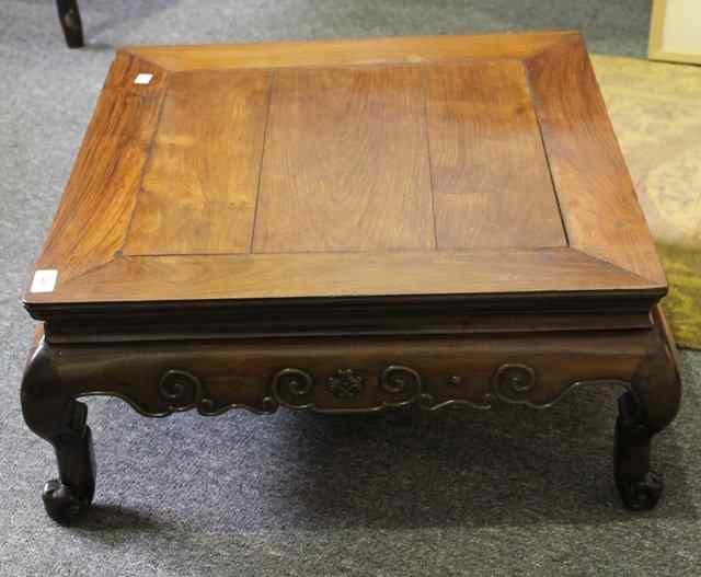 Appraisal: A CHINESE HARDWOOD SQUARE LOW TABLE with carved frieze on