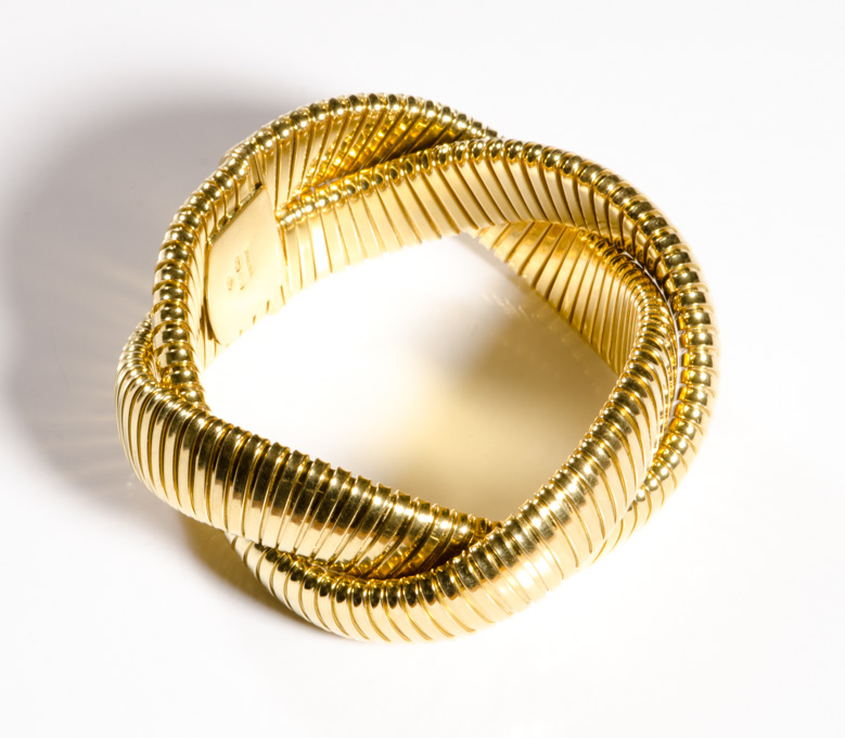 Appraisal: CARLO WEINGRILL EIGHTEEN KARAT GOLD 'TUBOGAS' WEAVE BRACELET Carlo Weingrill