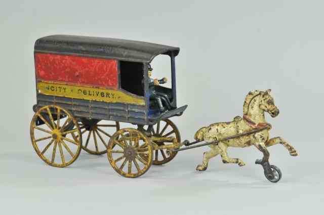 Appraisal: a HARRIS CITY DELIVERY Harris cast iron wagon painted in