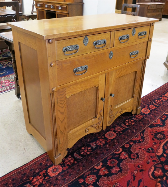 Appraisal: LATE VICTORIAN OAK BUFFET American c having three drawers over