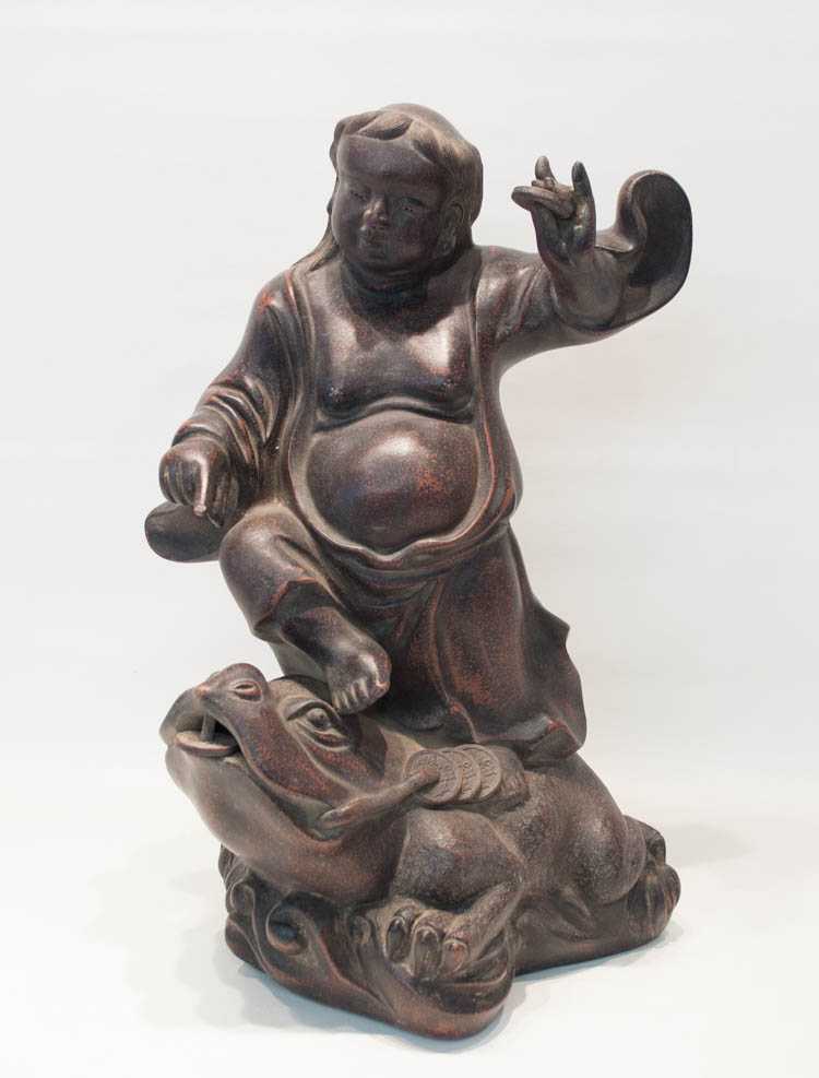 Appraisal: CHINESE ZISHA FIGURAL SCULPTURE depicting a figure holding money while