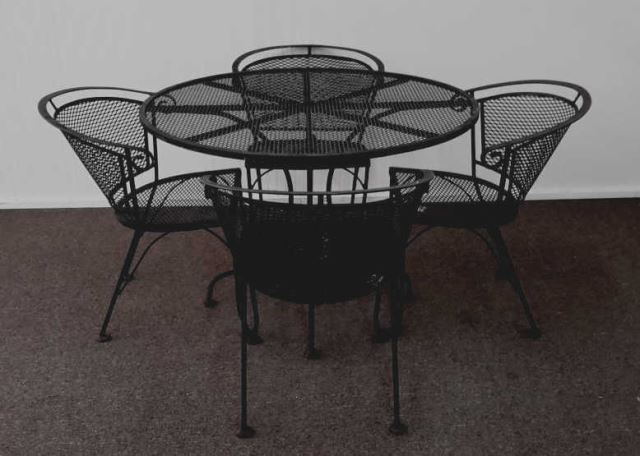 Appraisal: Wrought Iron Piece Patio Set Includes a round patio table