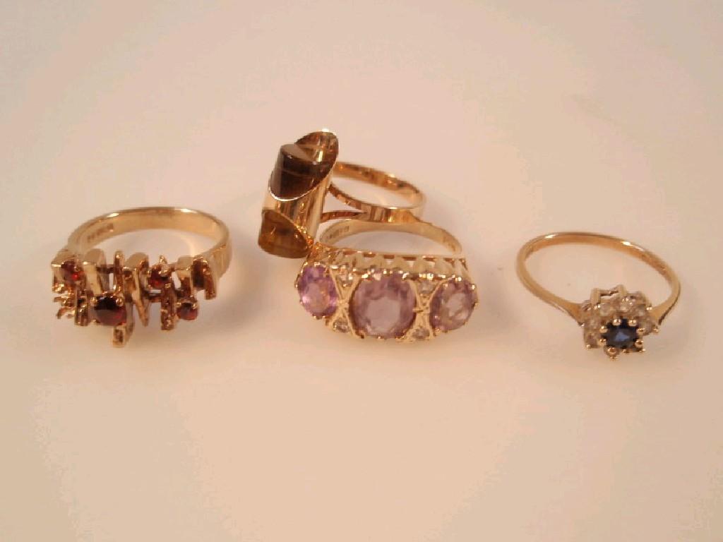 Appraisal: Four ct gold gem set dress rings