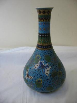 Appraisal: A CHINESE PORCELAIN VASE of bottle form enamelled with butterflies