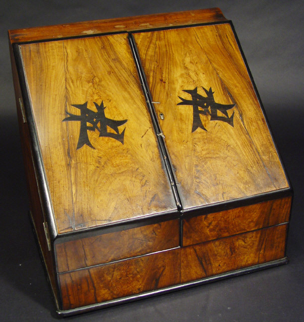 Appraisal: Victorian inlaid walnut stationery box the hinged doors enclosing a