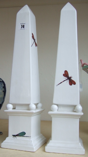 Appraisal: A pair of th century white glazed Italian obelisks decorated