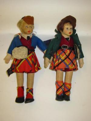 Appraisal: A pair of Lenci dolls with moulded and painted faces