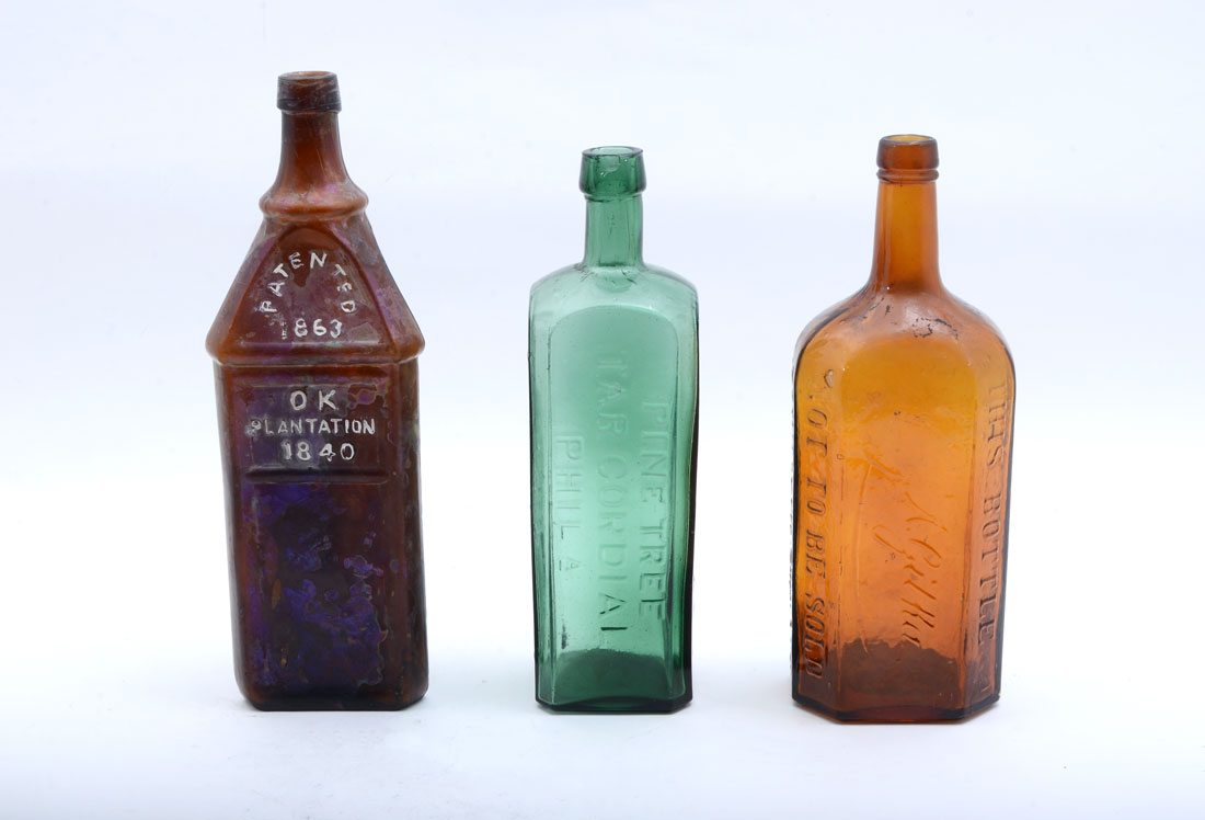 Appraisal: ANTIQUE LIQUOR MEDICINE BOTTLES pieces total to include ''Pine Tree