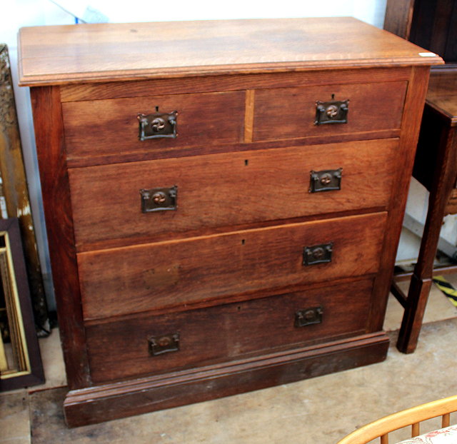 Appraisal: AN EDWARDIAN OAK CHEST of two short and three long