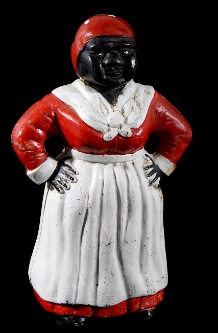 Appraisal: Hubley Cast Iron Mammy Coin Bank Featured in this lot