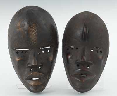 Appraisal: Two Dan Tribe Masks Ivory Coast th Century Carved wood