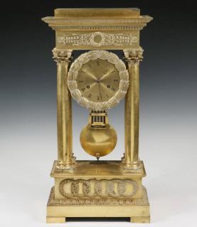 Appraisal: FRENCH PILLAR CLOCK Early th c Gilt Bronze Empire Style