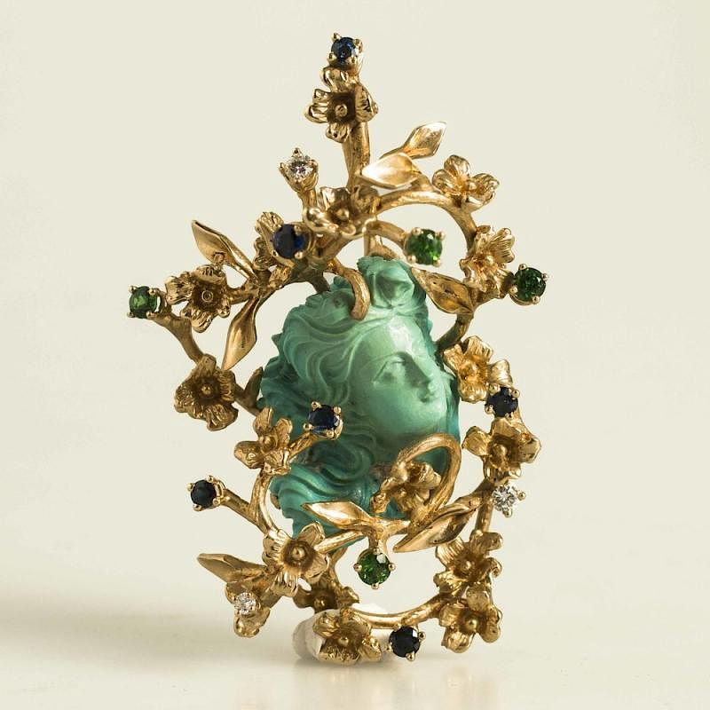 Appraisal: K Turquoise Cameo Pendant with Diamonds Sapphires Garnets k high