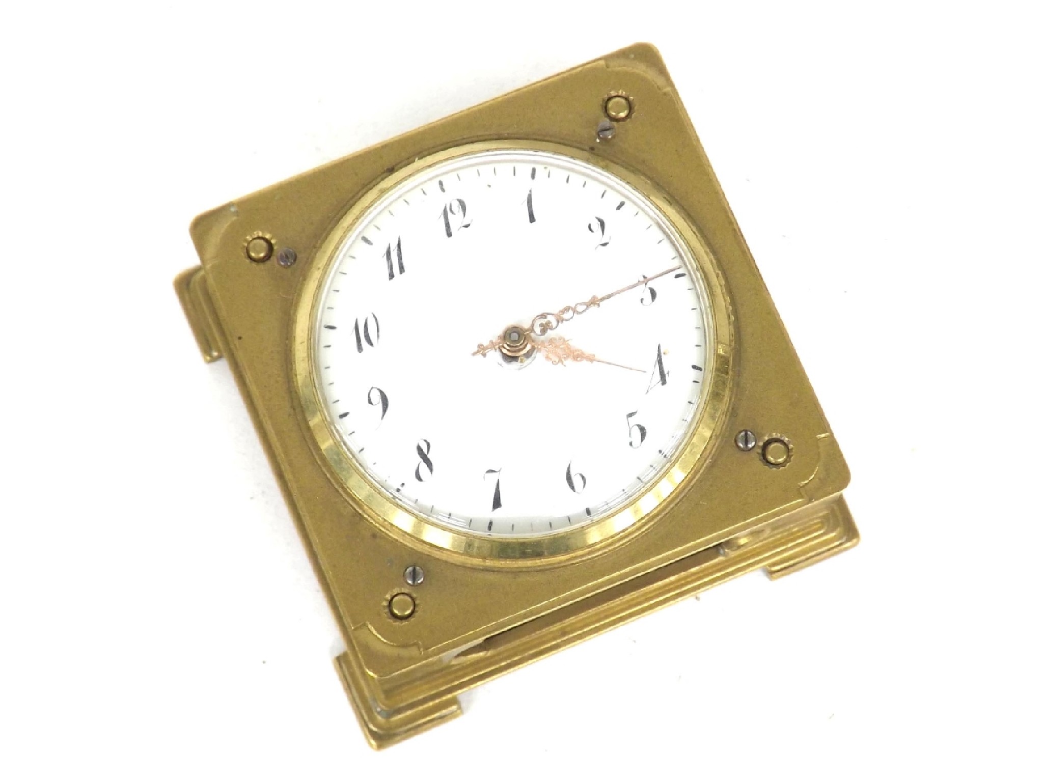 Appraisal: Miniature brass table timepiece within a square case with visible