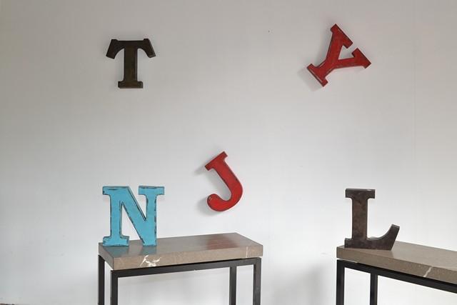 Appraisal: FIVE FRENCH VINTAGE METAL LETTERS