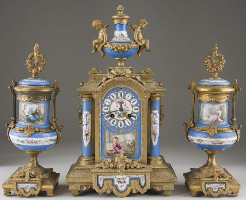 Appraisal: French Neoclassical Mantel Clock Garniture Set circa spelter and porcelain