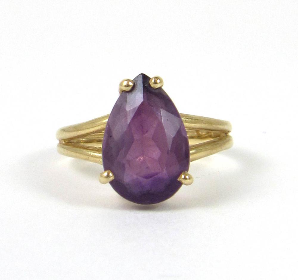 Appraisal: AMETHYST AND FOURTEEN KARAT GOLD RING with four yellow gold