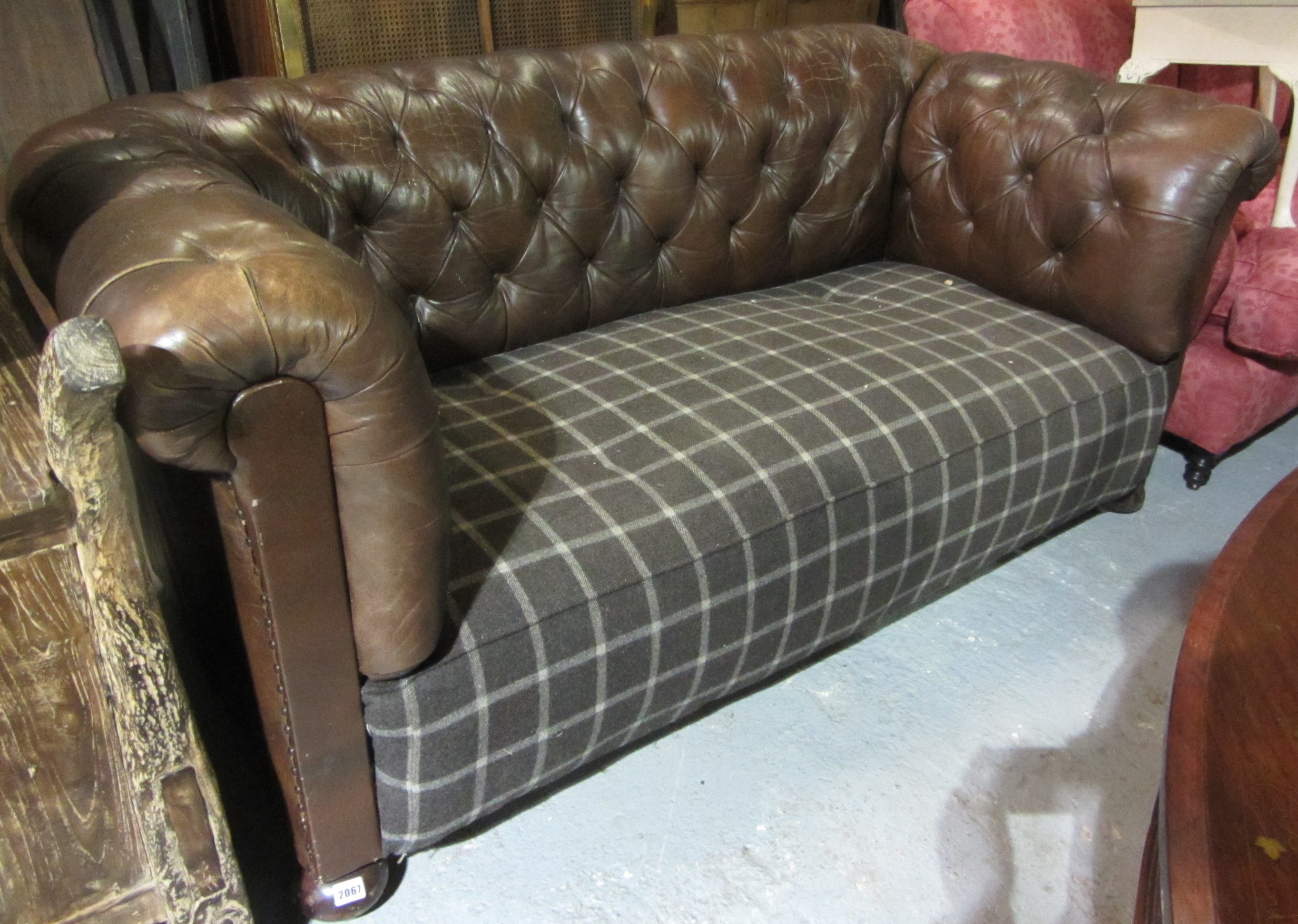 Appraisal: A brown leather Chesterfield sofa