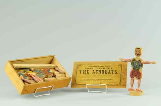 Appraisal: EARLY ACROBAT FIGURES BOXED SET Crandall's wood pieces able to