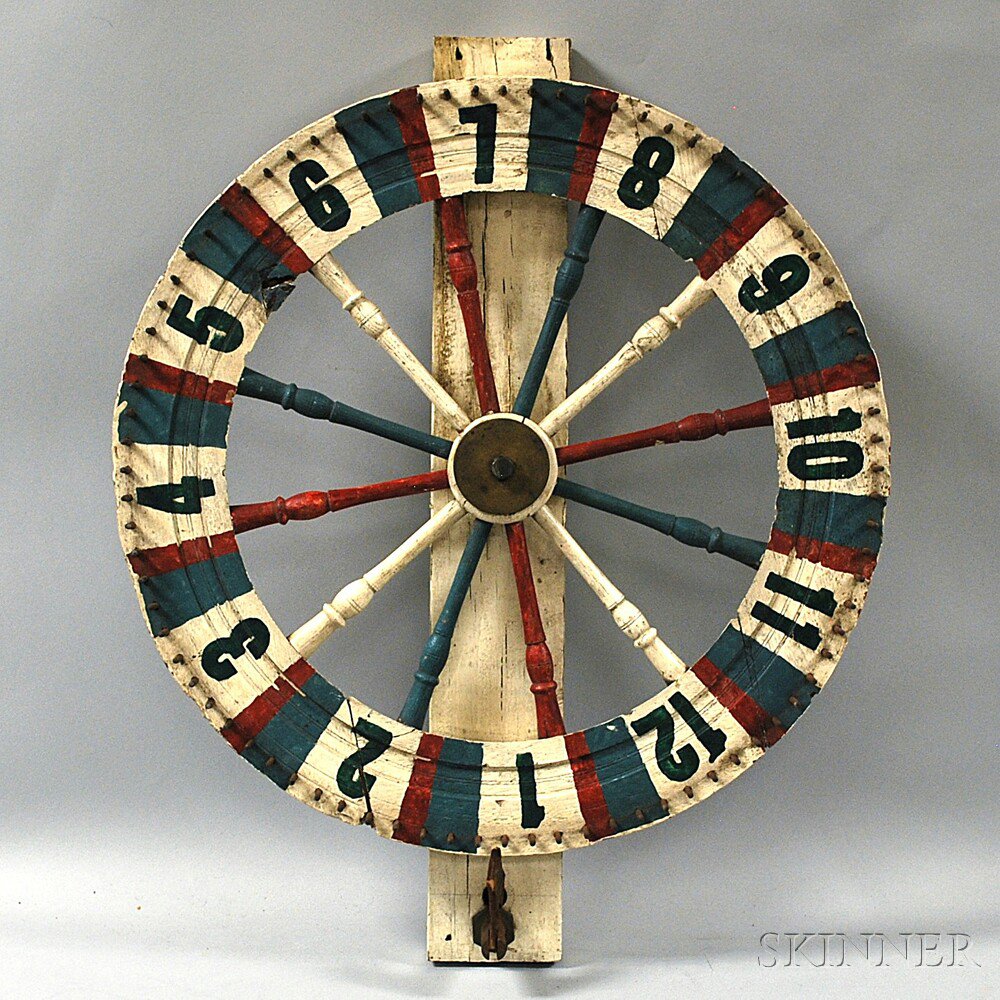 Appraisal: Polychrome Game of Chance the wheel numbered one through twelve