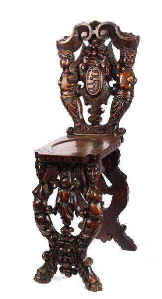 Appraisal: A pair of Italian Renaissance style hall chairs height in