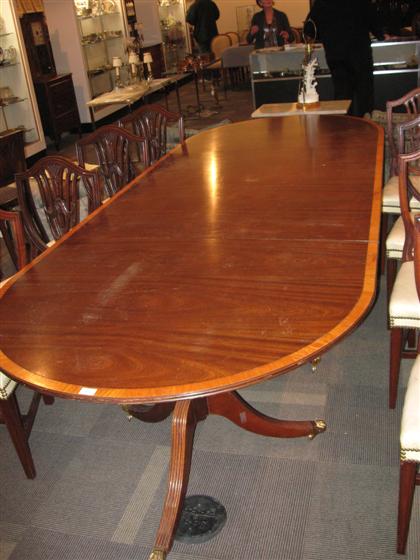 Appraisal: Federal style mahogany triple pedestal dining table th early th