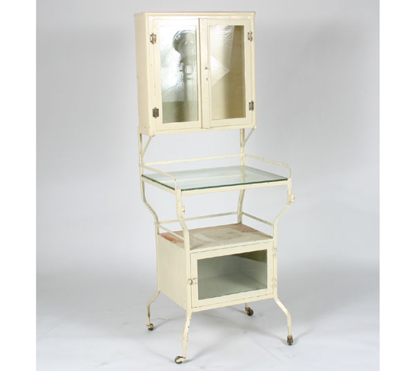 Appraisal: Vintage metal veterinary dental rolling stand with glass door cabinet