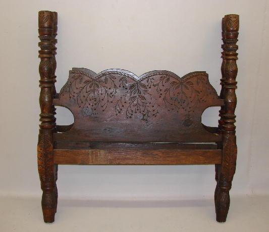 Appraisal: FOLKY CARVED BED American th century maple and pine Chip