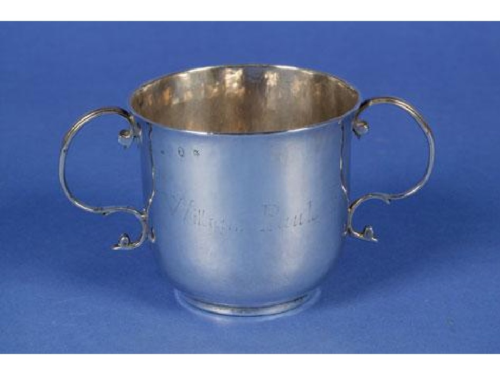 Appraisal: A QUEEN ANNE PORRINGER of circular form with scroll handles