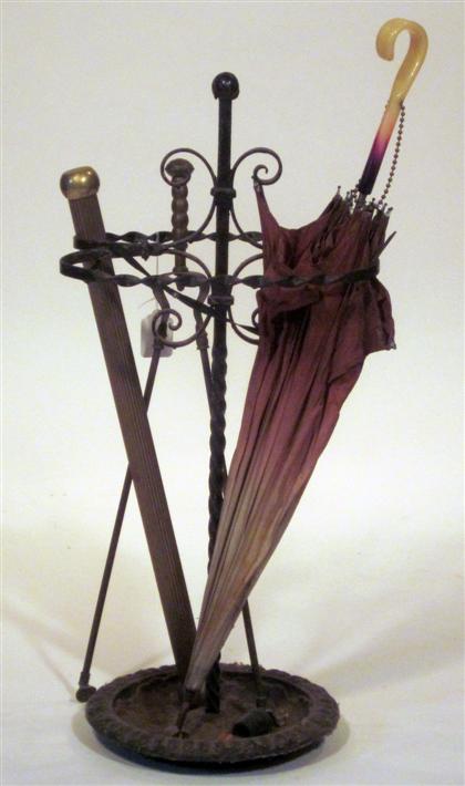 Appraisal: Wrought iron umbrella standToge Ther with an early twentieth century