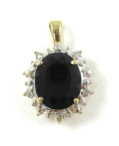 Appraisal: BLACK ONYX AND DIAMOND PENDANT k yellow and white gold