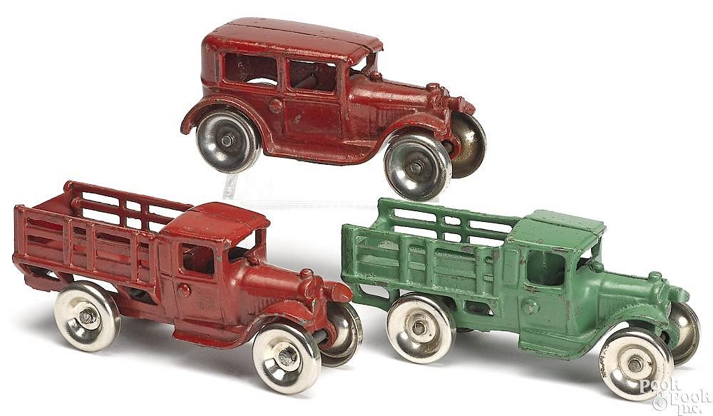 Appraisal: Three small Arcade cast iron vehicles Three small Arcade cast