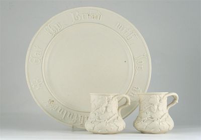 Appraisal: A large Parian dish probably Goss inscribed 'Eat thy bread