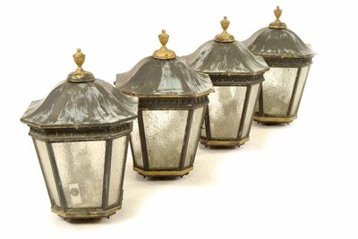 Appraisal: A set of four painted copper and glass lanterns each