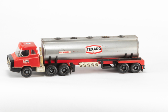 Appraisal: This lot consists of four vintage tin toy Trucks to