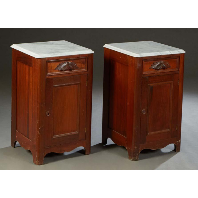 Appraisal: Pair of American Carved Walnut Marble Top Nightstands c the