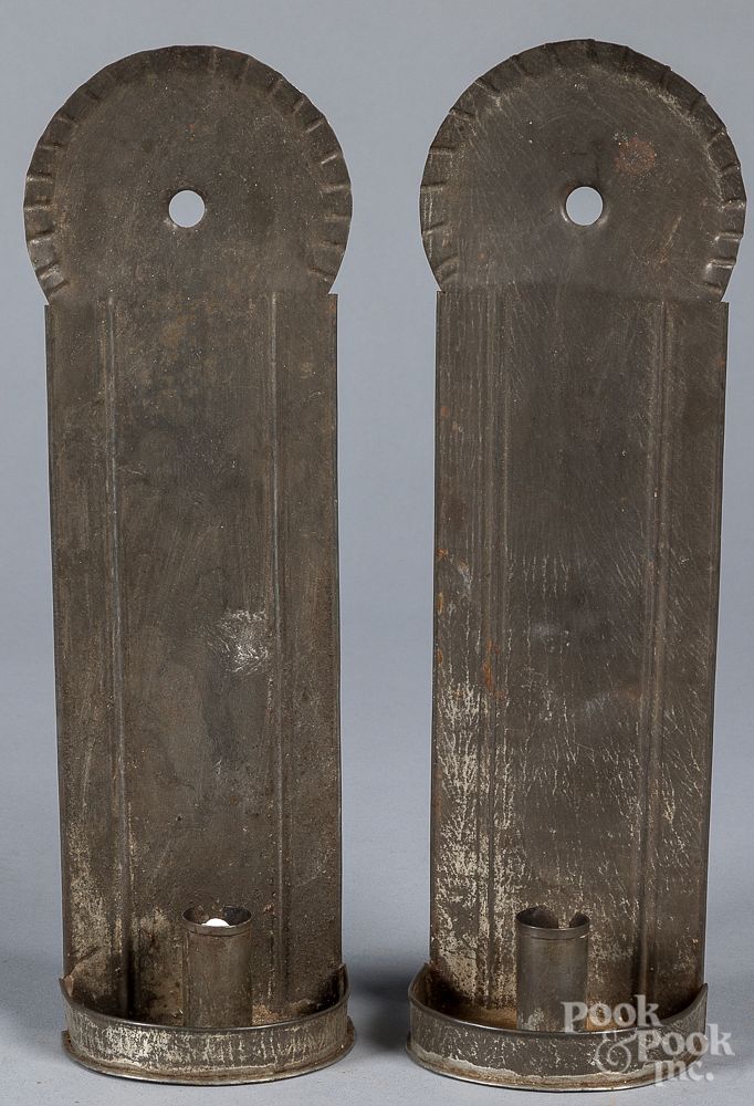 Appraisal: Pair of tin sconces th c Pair of tin sconces