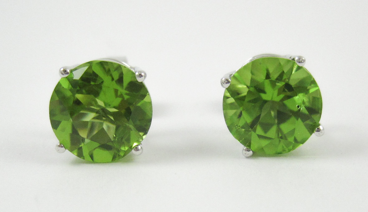 Appraisal: PAIR OF PERIDOT AND WHITE GOLD EAR STUDS Each k