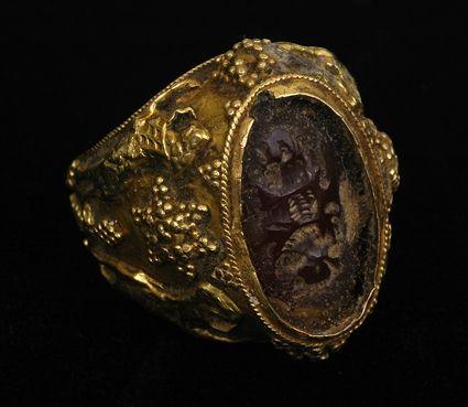 Appraisal: PERSIAN GOLD RING SET WITH INTAGLIO Size in Provenance Property