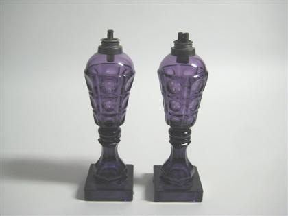 Appraisal: Pair of amethyst pressed glass fluid lamps boston and sandwich