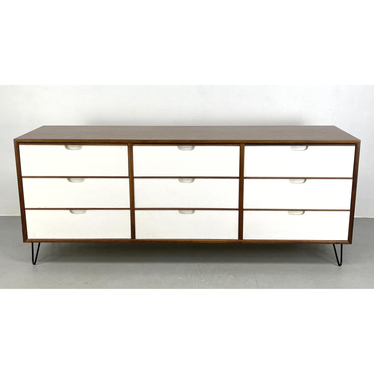 Appraisal: Modernist Laminate Triple Dresser with hairpin legs Painted front Dimensions