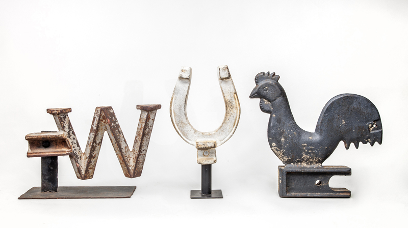 Appraisal: THREE WINDMILL WEIGHTS Comprising a cast-iron rooster and a white