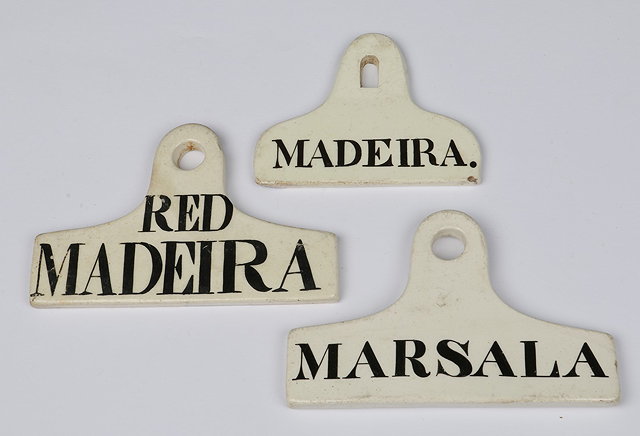 Appraisal: A CREAMWARE BIN END LABEL for Red Madeira one for