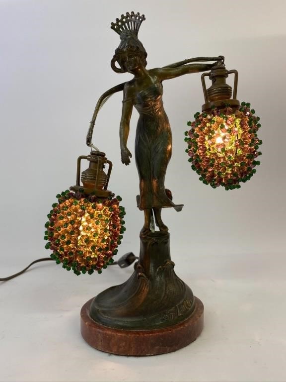 Appraisal: Spelter metal St Lucia figural table lamp with unusual green